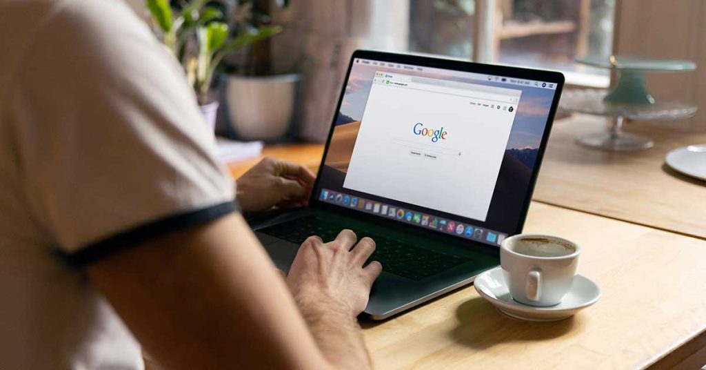 Hands visiting Google to download AI Chrome extensions