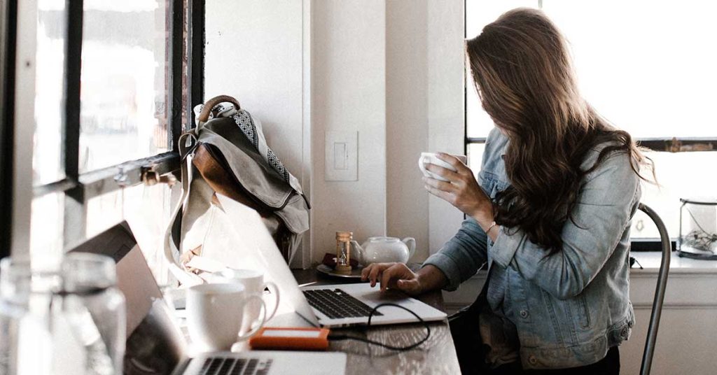 Woman in home office working on her personal branding strategy